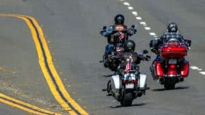 motorcycle riders on roadway